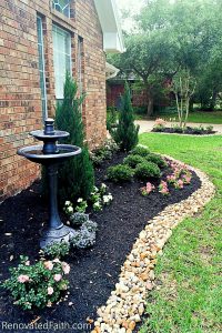 DIY Landscape Design – Want to save money by landscaping your yard but don’t know where to start? Planning your own landscape design can be overwhelming but these simple front yard landscaping ideas will give your yard a professional look without while staying on budget. #frontyardlandscapingideas #frontyardlandscapingideaswithstones #landscapearchitecture #smallfrontyard www.renovatedfaith.com