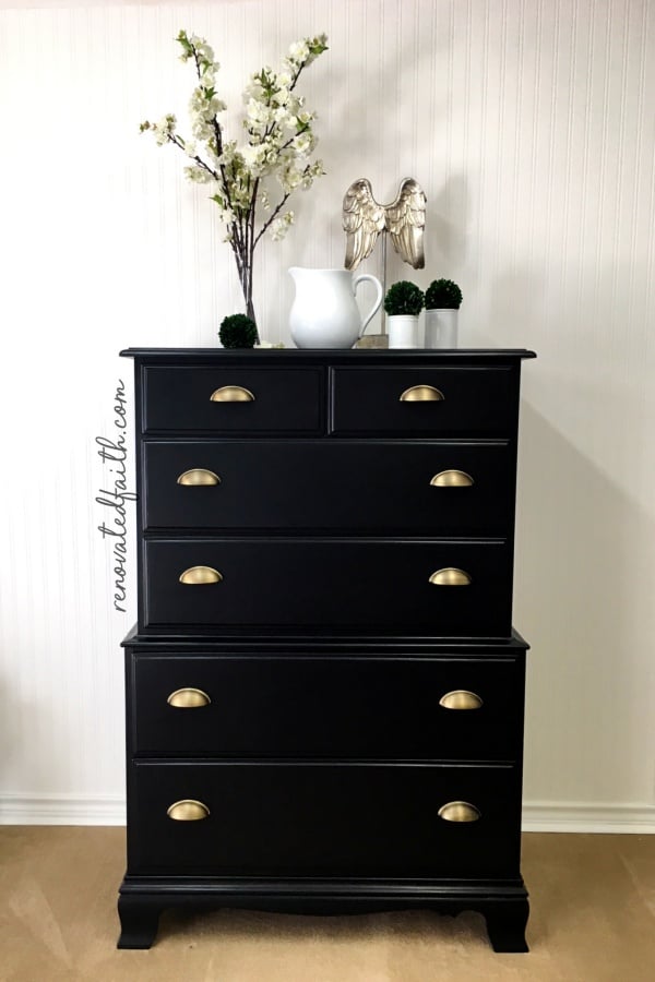 black dresser with champagne pulls