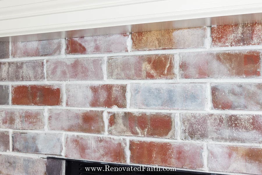 whitewash brick fireplace