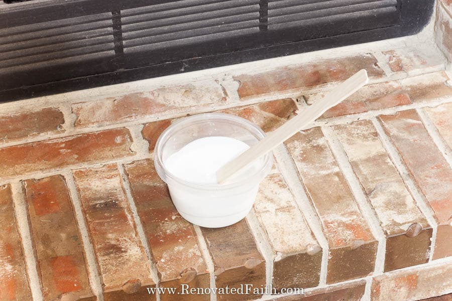 whitewash brick fireplace with paint