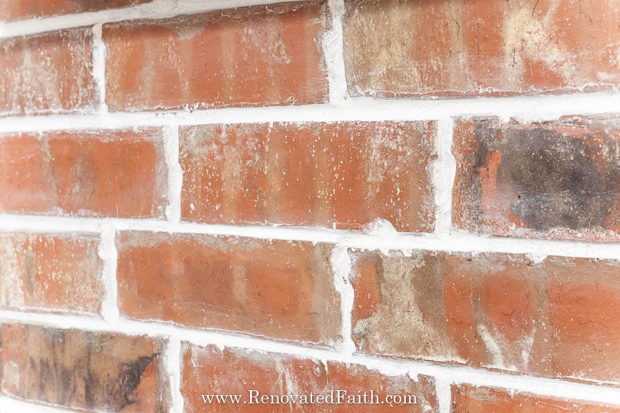 whitewash brick fireplace with paint