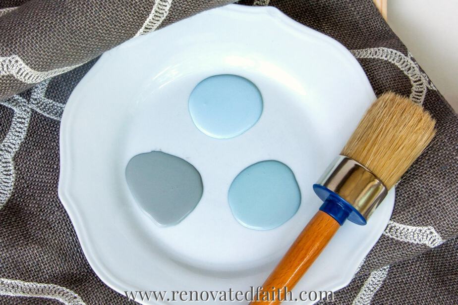 plate with different types of furniture paint and chalk paint brush