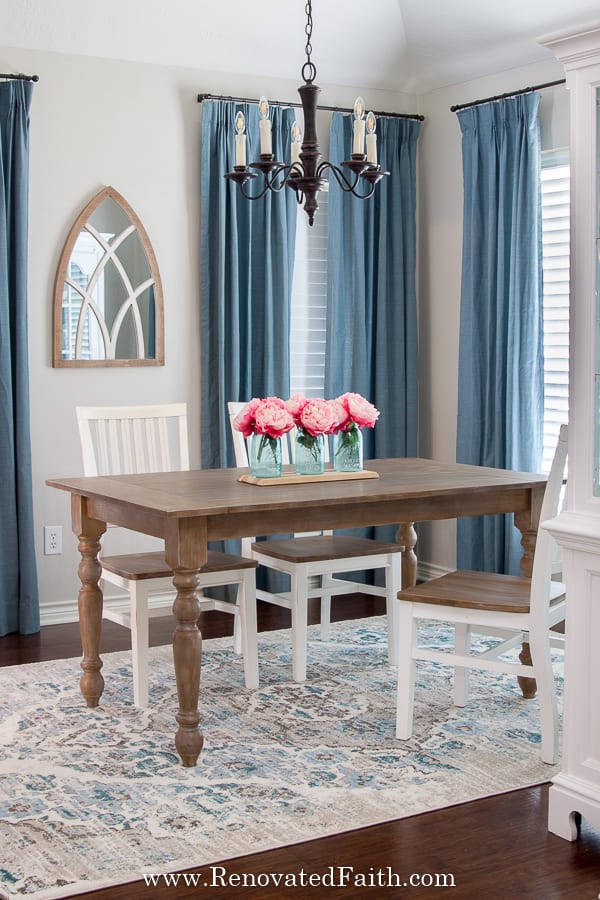 restoration hardware faux finish on a dining table