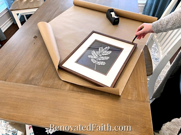 How To Hang Multiple Pictures On A Wall Evenly (Easy Hack!)