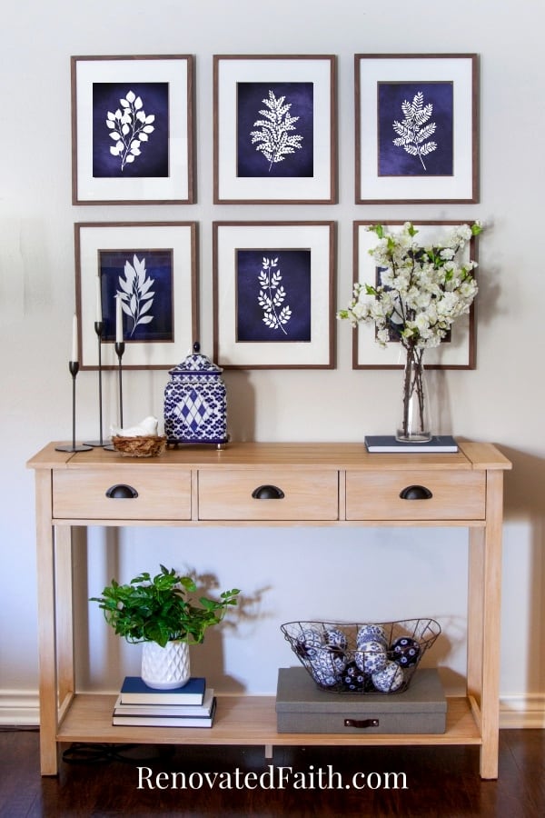 how to hang pictures evenly