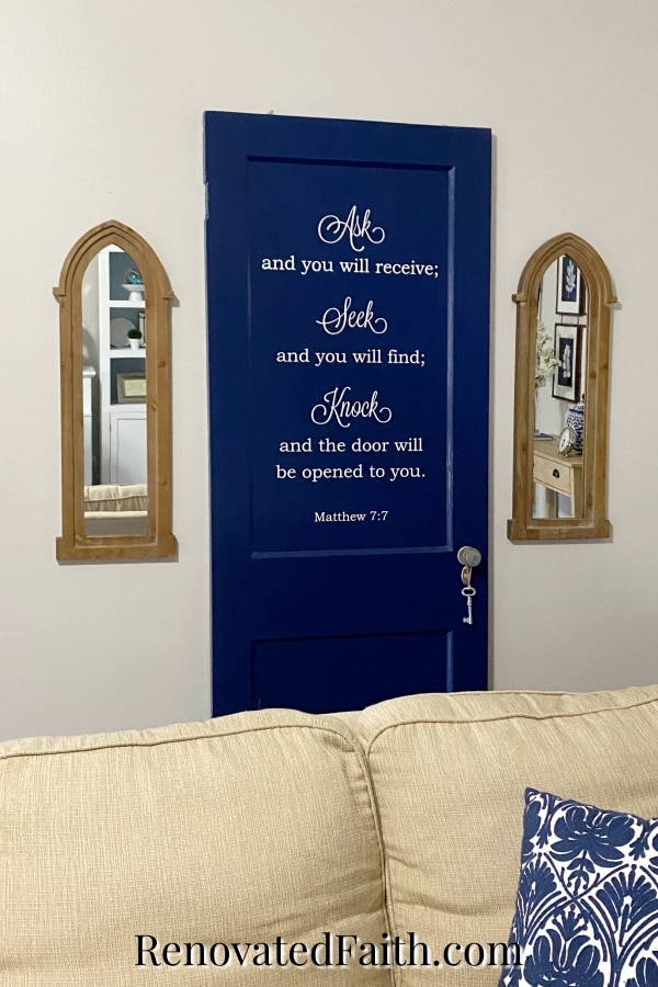 navy door with Bible verse