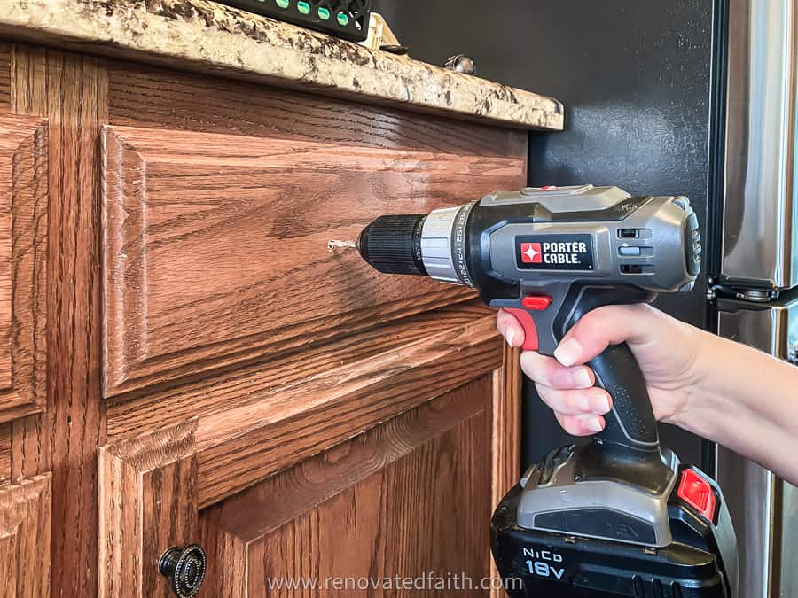 drilling holes for installing cabinet hardware