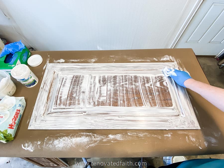 aquacoat being applied to cabinet door