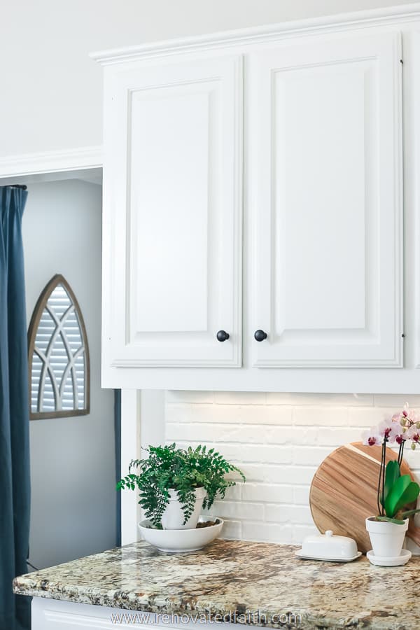 white cabinets filled with grain filler