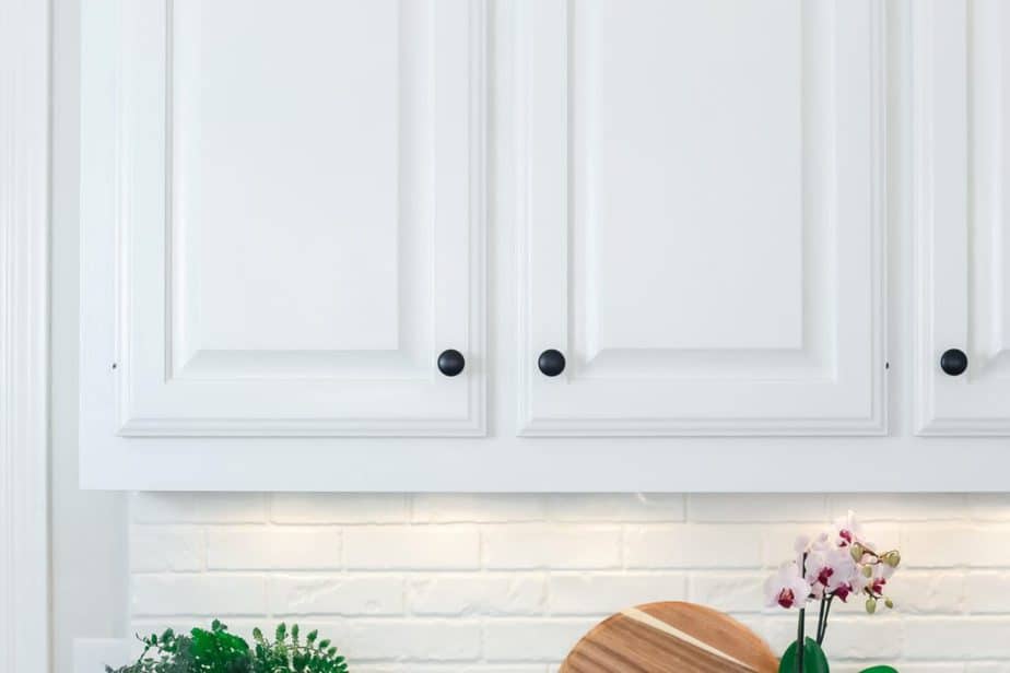 white cabinets with wood grain filler