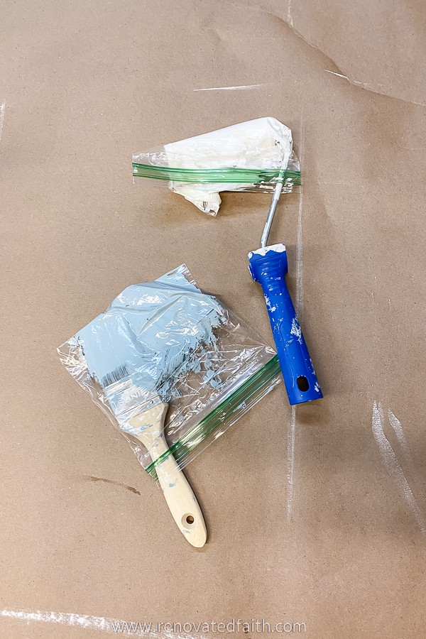 a paint bush and roller in baggies to put in refrigerator
