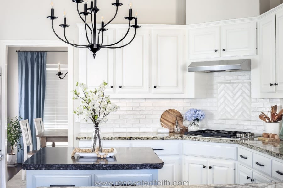 alabaster white kitchen cabinets with blue island