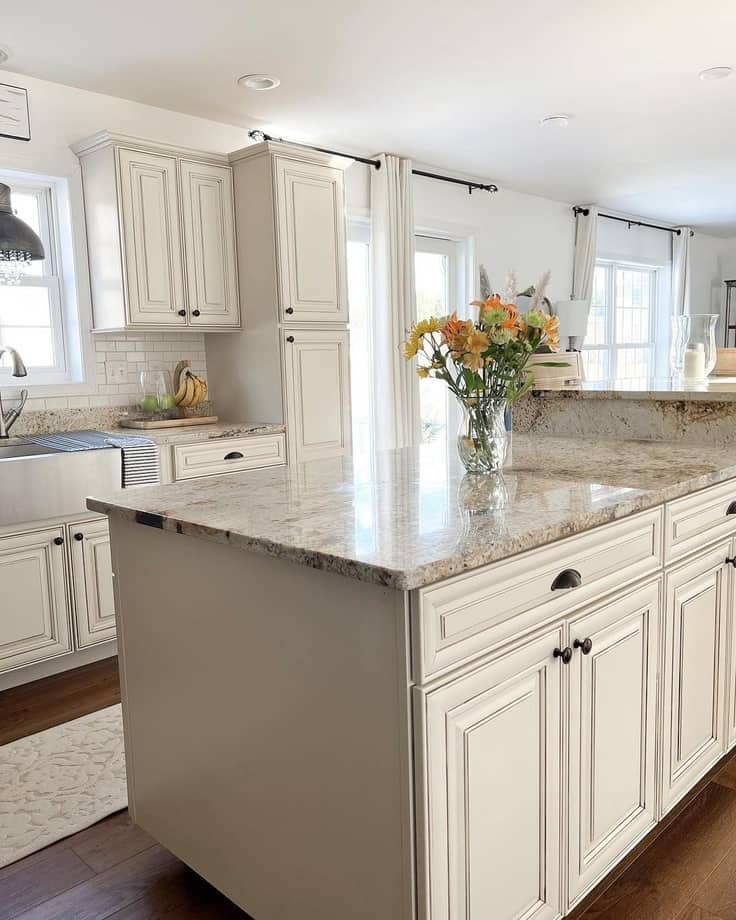 antique white kitchen cabinets with granite countertops