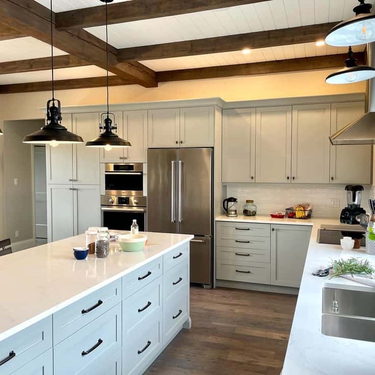 light gray cabinets in kitchen with wood accents