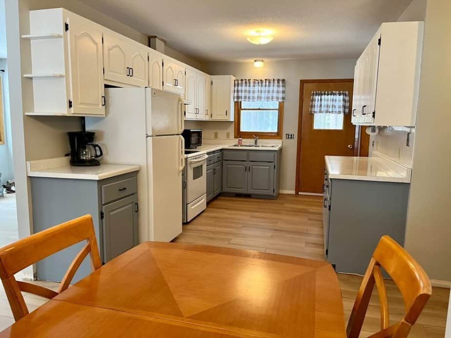 kitchen with lowers in blue-gray cabient paint color