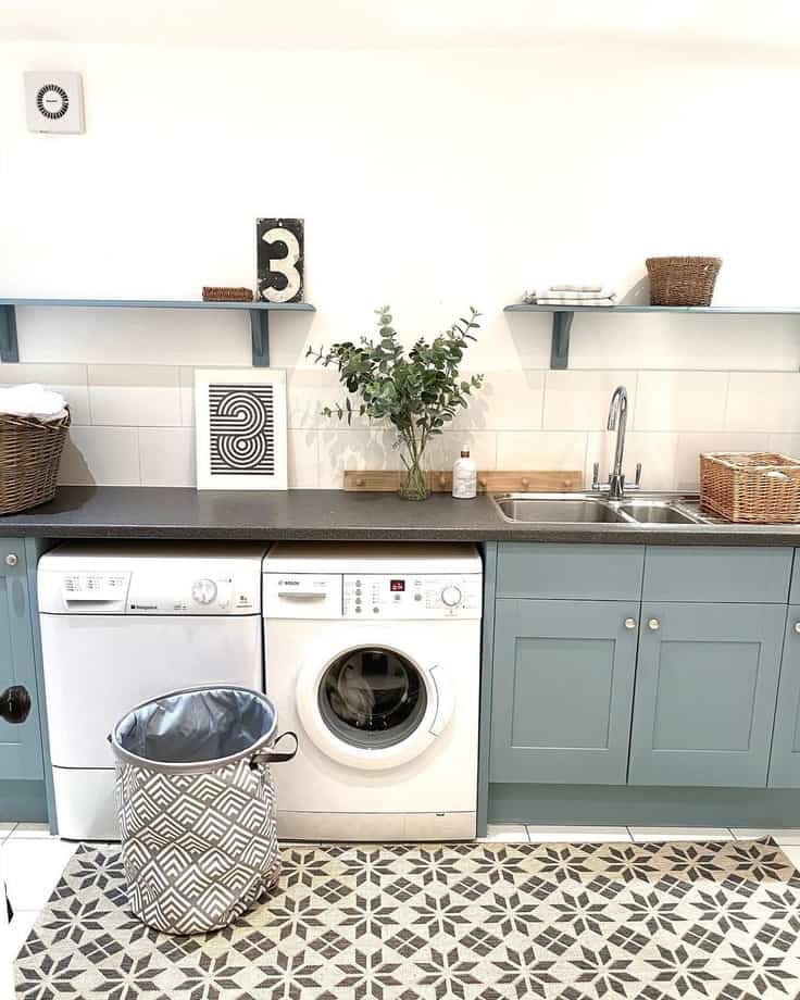 laundry room in a blue cabinet paint color