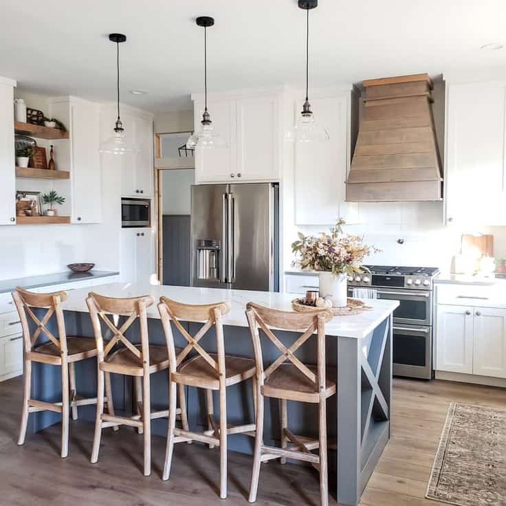 white kitchen with dark gray island