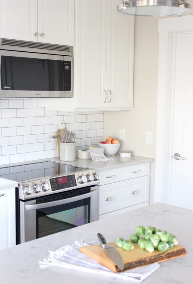 baby fawn on kitchen walls with white cabinets