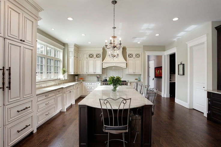 spanish olive on kitchen walls with white cabinets