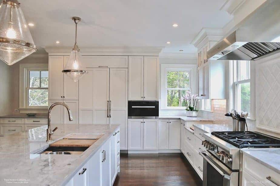 simply white kitchen walls and cabinets