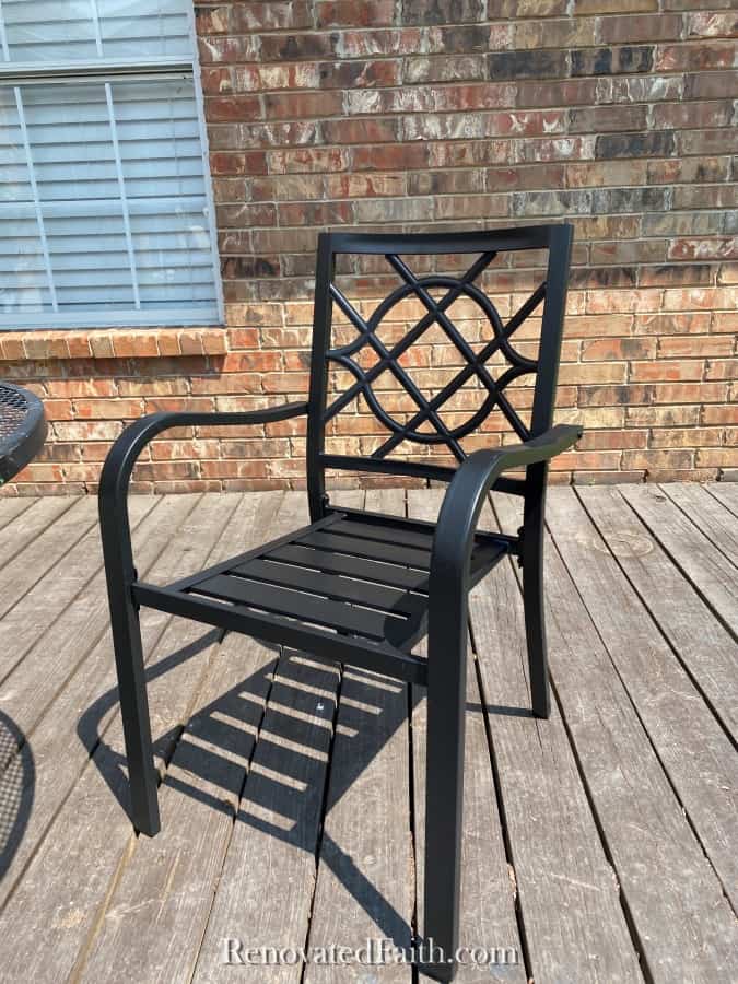 black outdoor chair before painting