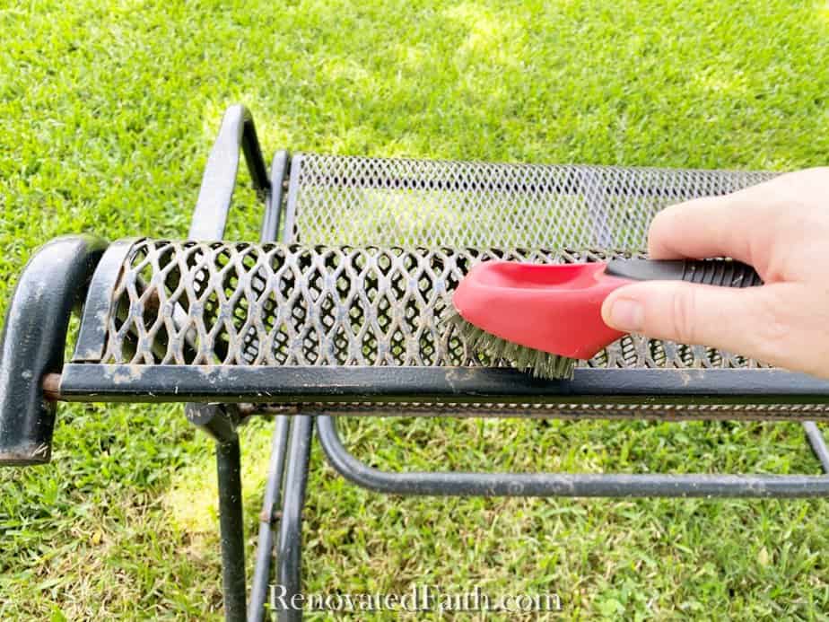 cleaning wrought iron furniture with a wire brush