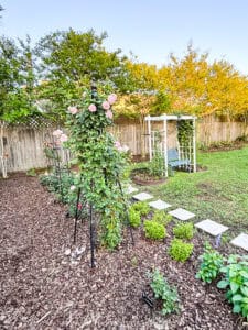 flower bed with obelisk
