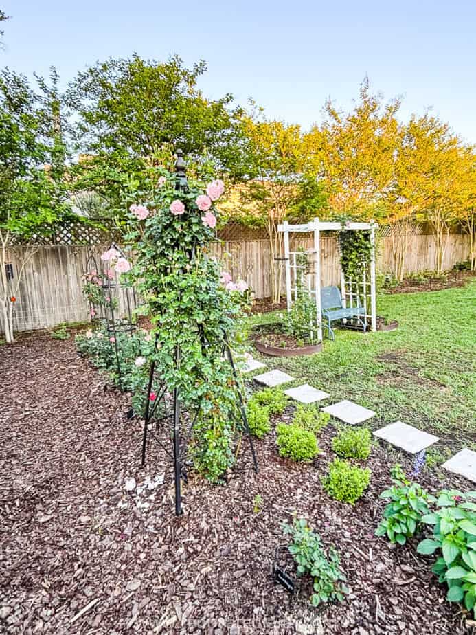 flower bed with obelisk