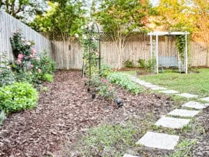 path in mounded flower bed