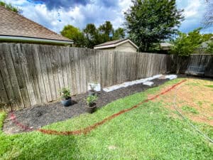 use spray paint to deliniate your new bed